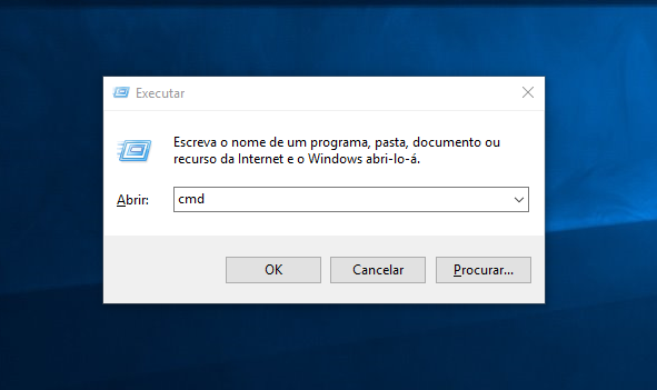 Digitando cmd e clique em OK